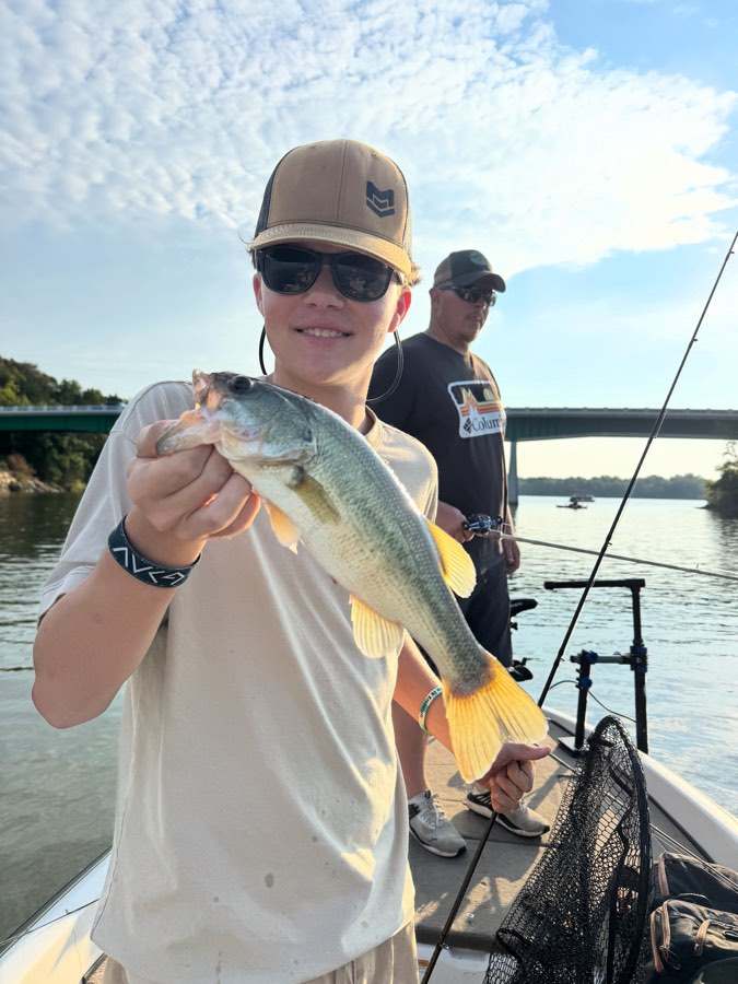 Aaron with a largemouth under the bridge on a September morning.