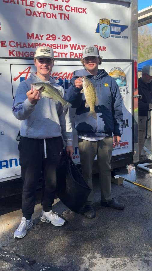 Weigh-in. Aaron on the right, in front of the Tennessee BASS Nation banner.
